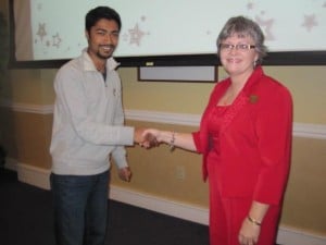 Nishan Shrestha, SI Leader for Dr. Bachri's physics classes, is awarded the fourth SI Scholarship in honor of Dr. Robert Terry by SI Coordinator, Lavana Kindle, for the Spring 2013 semester.
