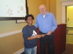 Thurisha Raigama, SI Leader for various math courses, is presented the third SI Scholarship by the award's honoree, Dr. Robert Terry during the Fall 2012 semester.
