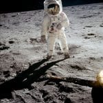 Astronaut Buzz Aldrin walks on the surface of the moon near the leg of the lunar module Eagle during the Apollo 11 extravehicular activity (EVA). 