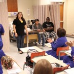 Nursing students applaude the visiting theatre students for the performances.