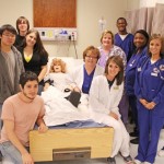 Theatre students, left, have been visiting nursing classes this semester for a new collaboration between the two departments to create hospital-like experiences for the nursing students.