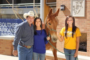 Rusty Hayes with Megan Maye, Molly Ann, and Payton Baird.