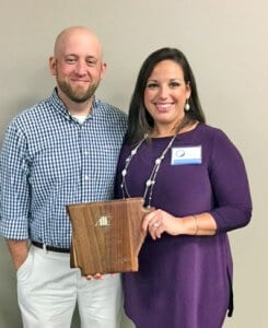 Mary and Bob Heinze with award