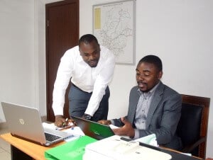 Glenn Muffih with collegue at CHAI in Cameroon