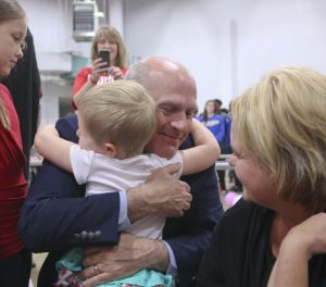 SAU Pres Dr Trey Berry and wife Dr Katherine Berry hug Kaylynn Sands - Make-A-Wish Sp16 - img_4101