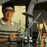 Photo of Xi Wu in a chemistry lab